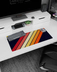 My Hero Academia mouse pad, 28x12 inches, featuring bold diagonal stripes in orange, red, and yellow against a navy background for a retro look.