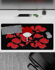 Striking 32x16 mouse pad combines Uchiha's fan emblem with red clouds for bold anime enthusiast appeal