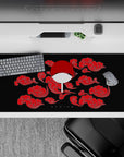 Iconic 36x16 desk pad highlights Uchiha's mighty Sharingan legacy with vivid red clouds and fan emblem