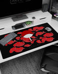 Bold Uchiha-themed 40x20 desk pad celebrates legendary shinobi heritage with vibrant red and black aesthetics