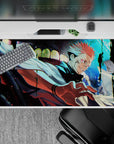 40x20 inches desk pad showcasing Sukuna’s sinister grin and glowing eyes, embodying his unmatched strength and dark energy from Jujutsu Kaisen.