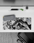 28x12 inches mouse pad showcasing Guts in action with his Dragonslayer sword, ideal for creating a bold, powerful atmosphere at your desk.