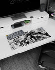 Berserk mouse pad, 28x12 inches, featuring Guts with his Dragonslayer sword, perfect for fans seeking strength and determination in their workspace.