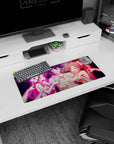 28x12 inches anime mouse pad showing a flustered black-haired guy pulled by two ribbon-bow girls, ghost hands below.