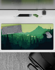 32x16 inches mouse pad showcasing a hiker's silhouette with rich green tones for a tranquil, nature-filled workspace.