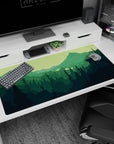 Large 40x20 inches mouse pad with a hiker's silhouette, rich greens, and a calming nature-inspired aesthetic.