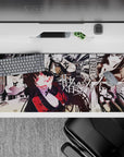 Black, cream, and crimson anime desk pad 36x16 inches with dramatic, risky vibe and sly smile.