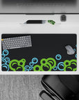 Energetic 32x16 desk mat combines vibrant hues and dark contrasts for impactful yet stylish visuals