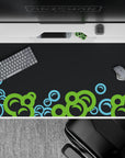 Playful 40x20 desk pad showcases floating bubbles against a dark background for a sleek and joyful workspace vibe