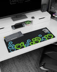 Small but impactful 32x12 desk mat showcases playful elegance with striking green and blue artistry