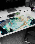 White-haired crowned goddess lounging under deep teal palms on an anime desk pad 40x20 inches.