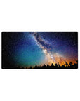 Milky Way night hike landscape mouse pad, 32x16 inches, with stars and amber horizon glow.