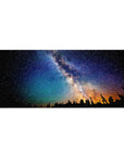 Milky Way night hike desk pad, starry sky with amber horizon glow, 36x16 inches.