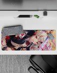 Sunset bokeh anime girl mouse pad 32x12 inches in red, black, and gold with ruby-eyed intensity.