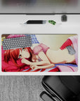 32x16 inches anime girl mouse pad in candy pinks, peach tones, and cool blue sheets for a cozy flirt vibe.