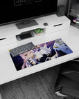 Winking long pink-haired anime girl amid flying debris on purple night backdrop, mouse pad 28x12 inches.