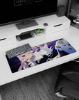 Winking pink-haired anime girl amid flying debris on purple backdrop, extended mouse pad 32x12 inches.
