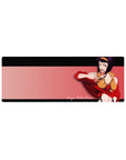 Compact 32x12 inches mouse pad featuring Faye Valentine, her signature smirk, and a grid-patterned backdrop for a modern-retro blend.