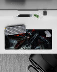 28x12 inches mouse pad with Guts in his Berserker Armor, battling the Beast of Darkness, perfect for fans of fierce, emotional artwork in their workspace.
