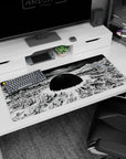 Anime desk pad 36x16 inches showing a black sun above broken towers and rubble fields spiraling into a vortex.