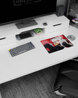 White-haired demon girl lounging on desk mouse pad 14x10 inches, crimson eyes, spoon with honey, books.