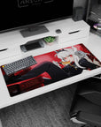 White-haired crimson-eyed demon girl lounging with honey spoon on anime desk pad 36x16 inches.