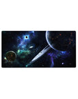 Cosmic desk mouse pad 32x16 inches with ringed planet, neon nebula haze, and starry black sky.