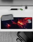 Inky navy fading into ember red and glowing orange, 32x12 inches mouse pad with cozy dramatic space vibe.