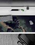 Intense energy 36x16 desk pad featuring Eren’s Titan transformation with dark shadows and fiery highlights, capturing the fury of the battlefield