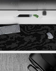 36x16 inches mouse pad with black-on-black camouflage, blending charcoal and graphite textures for a sleek and sophisticated desk look.