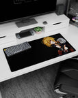 32x16 inches Tanya Degurechaff mouse pad, smirking in military uniform with insignia under monitor glow.