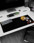 36x16 inches Tanya Degurechaff desk pad from Saga of Tanya the Evil, smirking in uniform under monitor glow.