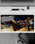 Minato from Naruto on a 32x16 inch anime mouse pad, standing against a sunset sky with golden and crimson light.