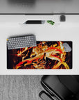 Rengoku from Demon Slayer anime mouse pad, 28x12 inches, featuring fiery design with orange, red, and gold hues.