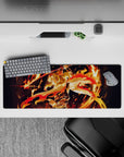 Anime mouse pad featuring Rengoku from Demon Slayer, 32x12 inches. Vibrant flames and dynamic action capture heroic energy.