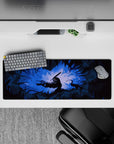 32x12 inches mouse pad with Guts in his Berserker Armor, surrounded by jagged shadows and glowing blue light, perfect for creating an intense atmosphere in your workspace.