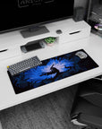 Artistic 32x12 inches mouse pad showcasing Guts in his Berserker Armor surrounded by glowing blue light and jagged shadows, perfect for adding intensity to your desk setup.
