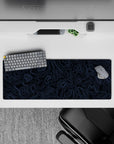 Intense 32x12 desk mat features flowing blue lines and minimalist artistry with intricate details for fans of modern design