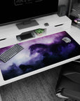 Shadowy horse silhouette emerging in a dreamy starry nebula desk pad, 40x20 inches.