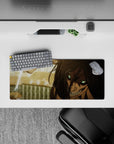 Unstoppable rage 28x12 mouse pad featuring Eren Yeager's Attack Titan, glowing eyes, and crackling lightning for an intense and dynamic desk experience