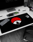 40x20 inch anime mouse pad featuring Itachi Uchiha against a red Uchiha crest; perfect for Naruto fans.