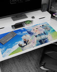 40x20 inches anime desk pad featuring a white-haired girl with animal ears and her friend in a windy hillside scene.
