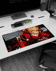 32x16 inches anime mouse pad showing spiky blond shooter in crimson coat and orange shades aiming a pistol.
