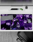 Impactful 32x16 desk pad combines deep blacks, glowing purples, and sharp linework for visually striking yet functional visuals