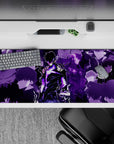 Striking 36x16 desk pad highlights Jin-Woo’s shadow forms, intricate details, and vibrant purple bursts in stunning visual contrast