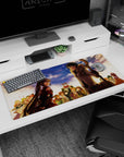 Hero duo anime desk pad 36x16 inches: red twin-tail girl, glasses boy with fur coat and golden staff.