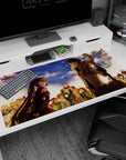 40x20 inches anime desk pad featuring red-outfit twin-tailed heroine and glasses boy with fur coat and staff.