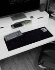 Small but impactful 32x12 desk mat showcases serene sophistication with striking dark purple-and-black contrast
