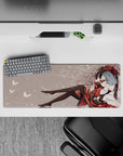 32x12 inches desk mouse pad in ruby red and black on pale backdrop, cozy dark gothic vibe with butterflies.