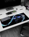 Anime girl desk pad 36x16 inches showing a cat-eared fighter mid-strike, scythe raised with neon-blue ribbon trail.